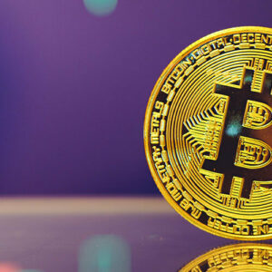 Bitcoin on purple background