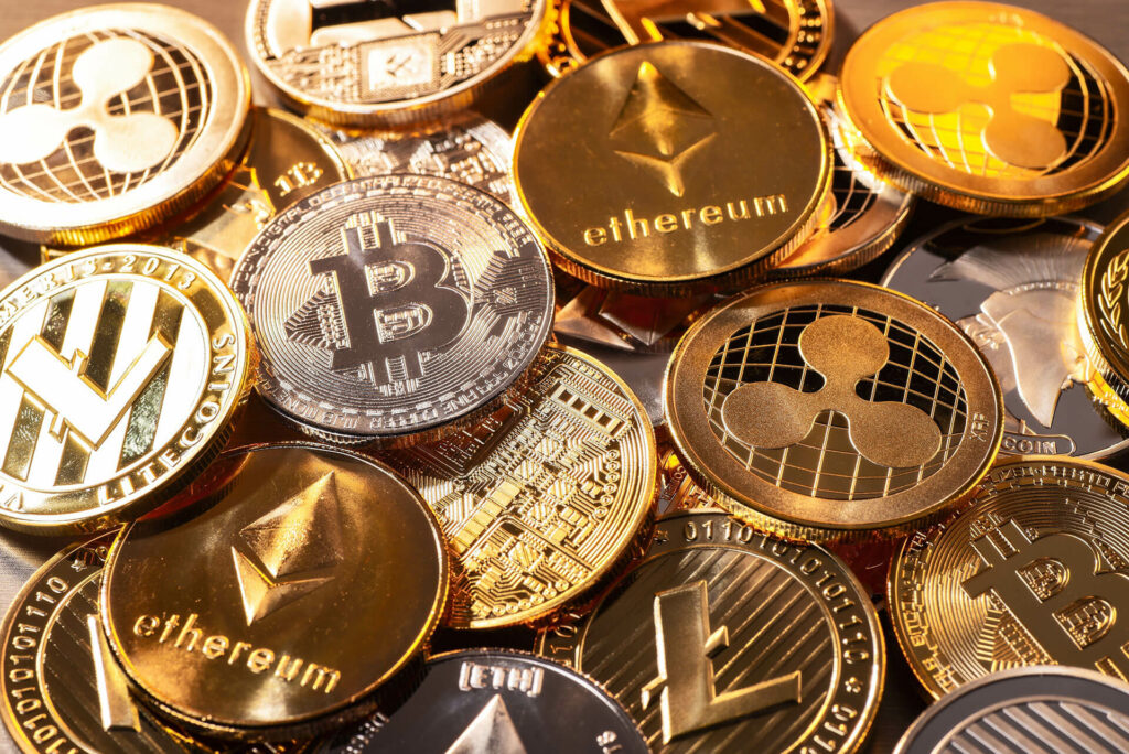 Pile of gold and silver physical crypto coins