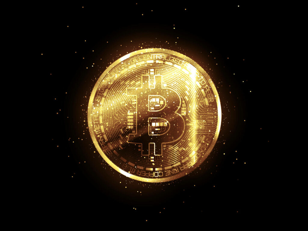 Golden bitcoin on black background
