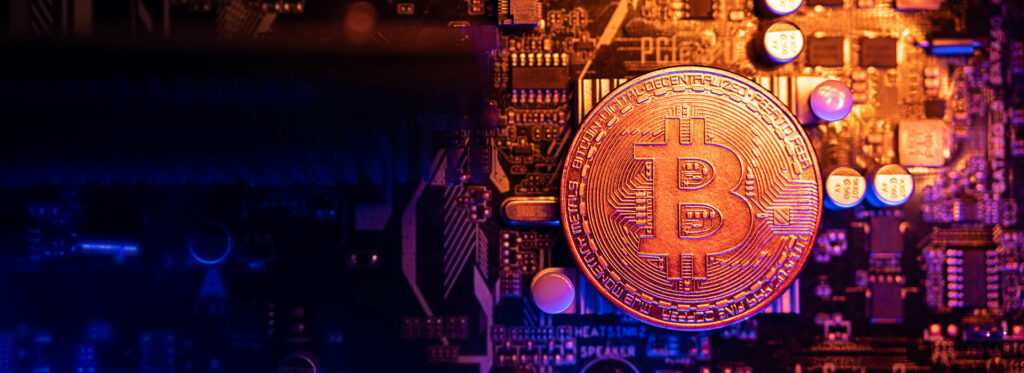 Bitcoin on top of circuit with gradient light
