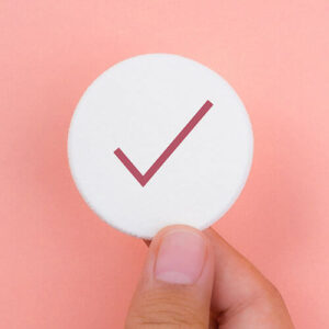 Checkmark icon on hand