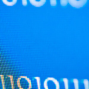 Binary code on blue monitor
